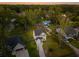 Aerial view of a well-maintained neighborhood surrounded by lush greenery at 1989 Nitsa St, Johns Island, SC 29455