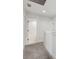Upstairs landing gives way to a bathroom with a white shower and tiled floors at 1989 Nitsa St, Johns Island, SC 29455