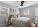 Bright bedroom with a ceiling fan, natural light, and modern decor at 1990 Butternut St, Charleston, SC 29414