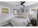 Bright bedroom with a ceiling fan, natural light, and stylish decor at 1990 Butternut St, Charleston, SC 29414