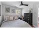 Bedroom features a ceiling fan, natural light, decor and stylish dresser at 1990 Butternut St, Charleston, SC 29414