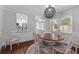 Open dining area adjacent to the kitchen features ample seating and natural light at 1990 Butternut St, Charleston, SC 29414