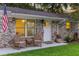 Inviting front porch with comfortable rocking chairs offering a cozy outdoor seating area at 1990 Butternut St, Charleston, SC 29414