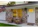 Inviting front porch with comfortable rocking chairs offering a cozy outdoor seating area at 1990 Butternut St, Charleston, SC 29414