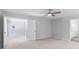 Bright bedroom featuring neutral paint, a ceiling fan, and plush carpeting at 206 Palfrey Dr, Ridgeville, SC 29472