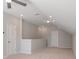 Spacious, bright bonus room, featuring plush carpeting and ample recessed lighting at 206 Palfrey Dr, Ridgeville, SC 29472