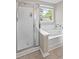 Bathroom featuring a shower and a bathtub with natural light from the window at 207 Breckingridge Dr, Ladson, SC 29456