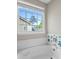 Bathtub featuring blue sea turtle decoration and natural light from the window at 207 Breckingridge Dr, Ladson, SC 29456