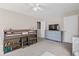 Bedroom with a bunkbed with storage, dresser, and neutral carpet and walls at 207 Breckingridge Dr, Ladson, SC 29456