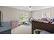 Spacious bedroom with a bunk bed, storage units, and large windows offering plenty of natural light at 207 Breckingridge Dr, Ladson, SC 29456