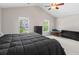 Spacious bedroom featuring a ceiling fan, two windows, and neutral walls at 207 Breckingridge Dr, Ladson, SC 29456