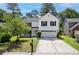 Beautiful two-story home with well-maintained landscaping and a spacious driveway at 207 Breckingridge Dr, Ladson, SC 29456