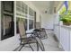 Inviting front porch with comfortable seating, creating a welcoming outdoor space at 207 Breckingridge Dr, Ladson, SC 29456