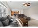 Open floor plan with a living room featuring leather furniture, a wooden coffee table, and an eat in kitchen area at 207 Breckingridge Dr, Ladson, SC 29456