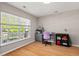 Bright home office with hardwood floors, a large window, and a gray desk and shelving at 207 Breckingridge Dr, Ladson, SC 29456