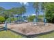 Community playground with blue structures and equipment, ideal for outdoor recreation at 207 Breckingridge Dr, Ladson, SC 29456