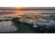 Stunning aerial shot of waterfront property with views of the marsh, water, and scenic surroundings at 226 Old House Ln, Dewees Island, SC 29451