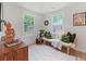 Bright bedroom with decorative pillows, neutral rug and a large window that fills the room with natural light at 2608 Seymour Ave, North Charleston, SC 29405