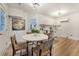 Inviting dining area with natural lighting, modern decor, and a round dining table at 2608 Seymour Ave, North Charleston, SC 29405