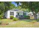 Charming home with neat landscaping, inviting porch, and classic architectural details at 2608 Seymour Ave, North Charleston, SC 29405