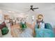Bright living room featuring an open floor plan that leads to dining area and kitchen at 2608 Seymour Ave, North Charleston, SC 29405