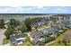 Beautiful aerial view showcasing charming homes, manicured lawns, and serene water views in a coastal neighborhood at 2879 River Vista Way, Mount Pleasant, SC 29466