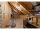 Unfinished attic space with exposed wooden beams, showing the potential for future development at 2879 River Vista Way, Mount Pleasant, SC 29466