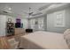 Comfortable bedroom with hardwood floors, modern furniture, and ample natural light at 2879 River Vista Way, Mount Pleasant, SC 29466