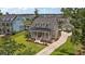 Beautifully landscaped two-story home with a welcoming front porch and well-maintained lawn at 2879 River Vista Way, Mount Pleasant, SC 29466