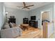Casual living area with hardwood floors and a ceiling fan at 2879 River Vista Way, Mount Pleasant, SC 29466