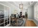 Bright office featuring hardwood floors, French doors and natural light at 2879 River Vista Way, Mount Pleasant, SC 29466
