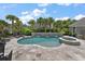 Stunning pool and hot tub combination with lush landscaping and elegant stone accents at 2879 River Vista Way, Mount Pleasant, SC 29466