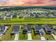 This is an aerial view of the neighborhood showing the ponds and the neat rows of homes at 291 Lucca Dr, Summerville, SC 29486