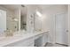 Bright bathroom with double vanity, modern fixtures, and a glass-enclosed shower provides an elegant feel at 291 Lucca Dr, Summerville, SC 29486
