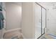 Bathroom featuring a tiled shower with glass door and a tiled floor at 291 Lucca Dr, Summerville, SC 29486