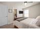Cozy bedroom with ceiling fan, TV and ensuite bathroom at 291 Lucca Dr, Summerville, SC 29486