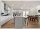 Open concept kitchen flows into dining area and living room at 291 Lucca Dr, Summerville, SC 29486