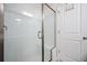 Shower features white tile with a glass door and a bench at 291 Lucca Dr, Summerville, SC 29486