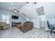 Bonus room featuring a ceiling fan, multiple couches, and a flat screen tv at 2997 Sturbridge Rd, Mount Pleasant, SC 29466