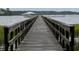 Beautiful long wooden dock over the water and marsh leading to a gazebo on the water at 2997 Sturbridge Rd, Mount Pleasant, SC 29466