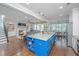 Open kitchen with a blue island, granite countertops, and views of the living and dining areas at 2997 Sturbridge Rd, Mount Pleasant, SC 29466