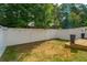 Lawn featuring a white fence, outdoor seating, and string lights at 3082 Emma Ln, Mount Pleasant, SC 29466