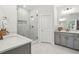 Bathroom featuring a glass enclosed shower, marble countertops, and gray cabinetry at 3082 Emma Ln, Mount Pleasant, SC 29466