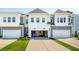 Charming home exterior with attached garage and well-maintained lawn, offering curb appeal and convenience at 3082 Emma Ln, Mount Pleasant, SC 29466