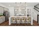 Bright kitchen features gray cabinetry, stainless appliances, pendant lights over island, and wood flooring at 3082 Emma Ln, Mount Pleasant, SC 29466