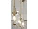 Elegant pendant lights hang above the kitchen island adding modern charm at 3082 Emma Ln, Mount Pleasant, SC 29466