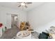 Bright playroom featuring neutral walls, a ceiling fan, gray carpet, and an assortment of toys at 3082 Emma Ln, Mount Pleasant, SC 29466