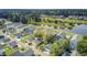 A neighborhood with colorful homes situated on well-kept streets and a serene pond in the background at 312 Germander Ave, Summerville, SC 29483