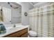 Bathroom featuring a shower with a curtain, a vanity with a sink, and a mirror at 312 Germander Ave, Summerville, SC 29483