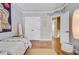 Spacious bedroom featuring a double closet, hardwood floors, and plenty of natural light at 312 Germander Ave, Summerville, SC 29483
